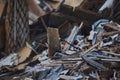 Ruins of a destroyed wooden house. Fragments of walls, boards, interior details. Summer sunny day.