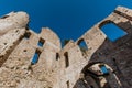 Ruins of the Doria Castle in Dolceacqua, arches, windows and walls, daytime, Italy