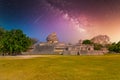 Ruins of El Caracol observatory temple, Chichen Itza, Yucatan, Mexico, Maya civilization with Milky Way Galaxy stars night sky Royalty Free Stock Photo