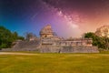 Ruins of El Caracol observatory temple, Chichen Itza, Yucatan, Mexico, Maya civilization with Milky Way Galaxy stars night sky Royalty Free Stock Photo