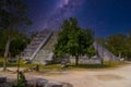 Ruins of El Osario pyramid, Chichen Itza, Yucatan, Mexico, Maya civilization with Milky Way Galaxy stars night sky Royalty Free Stock Photo