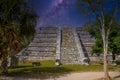 Ruins of El Osario pyramid, Chichen Itza, Yucatan, Mexico, Maya civilization with Milky Way Galaxy stars night sky