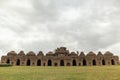 Ruins of the Elephant Stable inside Zanana enclosure at Hampi from 14th century Vijayanagara kingdom at Hampi, Karnataka, India Royalty Free Stock Photo