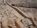 Ruins of antique village Qumran excavated by archaeologists, ancient aqueduct