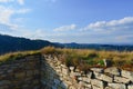 Ruins of fortification bulwark. Medieval rampart