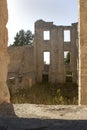 Ruins framed in a window.