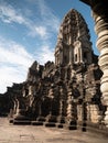 Ruins of historical Angkor Wat in the woods, Cambodia, vertical Royalty Free Stock Photo