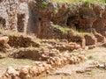 The ruins of a historical Byzantine town covered with green plants