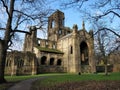 Ruins of Kirkstall Abbey under blue sky in Leeds, England Royalty Free Stock Photo