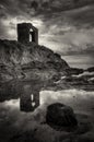 The ruins of Lady's Tower standing on the rocks overlooking the sea at Elie. Black and White.