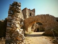 The ruins of a large old castle with an interesting background