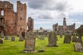 The ruins of Lindisfarne Priory with Lindisfarne Castle in background, on Holy Island Northumberland, U Royalty Free Stock Photo