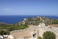 Ruins of the medieval castle of Kastellos with a beautiful view of the blue sea