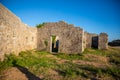 Ruins of medieval fortress Tvrdava Mogren at the shore of Adriatic sea, Montenegro.