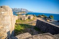 Ruins of medieval fortress Tvrdava Mogren at the shore of Adriatic sea, Montenegro.