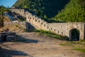 Ruins of medieval fortress Tvrdava Mogren at the shore of Adriatic sea, Montenegro.