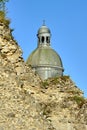 Ruins of medieval walls and dome of a historic church in the city of Provins Royalty Free Stock Photo