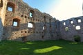 Niederhaus castle ruins with their castle walls, castle windows and a beautiful blue sky with a green meadow Royalty Free Stock Photo