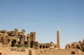 Ruins and obelisk in the complex of the Karnak temple, ancient architecture of Egypt in Luxor Royalty Free Stock Photo