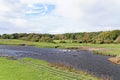 Ruins of Ogmore Castle in Vale of Glamorgan river Royalty Free Stock Photo