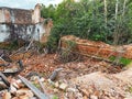 Ruins of an old abandoned deserted brick building demolition rubble shot as architectural scene Royalty Free Stock Photo