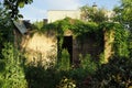 Ruins of an old brown brick house with an empty entrance Royalty Free Stock Photo