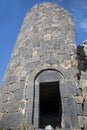 Ruins of an old castle. Entrance door and window of an old castle. Fortress towers and walls