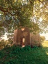 Ruins of an old church under green trees Royalty Free Stock Photo