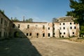 Ruins of the old Klevan castle. Ruined wall with windows against the blue sky. Courtyard. Rivne region. Ukraine