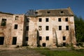 Ruins of the old Klevan castle. Ruined wall with windows against the blue sky. Courtyard. Rivne region. Ukraine