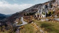 Ruins of old medieval village of Greolieres, drone aerial view of church, Alpes Maritimes, France