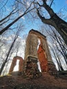 The ruins of an old ruined building, built of stone and brick, on a mountain in the park Royalty Free Stock Photo