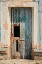 Ruins of an old school building in the city. The door of a dilapidated room. Royalty Free Stock Photo