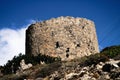 Ruins of old traditional windmill at Olympos village in Karpathos island