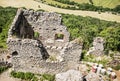 Ruins of Plavecky castle and old barrels with white color, Slovakia