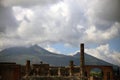 Ruins of Pompeii with the volcano Vesuvius in the cloudy background, Pompeii, Campania, Italy Royalty Free Stock Photo