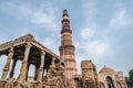 The ruins of the Qutub Minar pillar complex of ancient ruins in New Delhi India Royalty Free Stock Photo