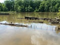 Ruins of sunken ship or boat in river water Royalty Free Stock Photo