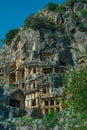 Ruins of Rock-cut tombs in ancient Lycian city of Myra. Lycian way, Demre, Antalya province, Turkey. Royalty Free Stock Photo