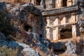 Ruins of a rocky necropolis with tombs carved in stone in Myra Lycian Royalty Free Stock Photo