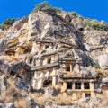 Ruins of a rocky necropolis with tombs carved in stone in Myra Lycian Royalty Free Stock Photo
