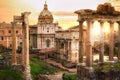 Ruins of Roman`s forum at sunset, ancient government buildings started 7th century BC. Rome Royalty Free Stock Photo