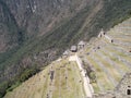 The ruins of the sloping stone floors of Machu Picchu