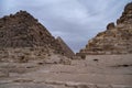 Ruins of the small pyramid of Queen Henutsen with Khafre Pyramids at background, Giza Plateau, Egypt. UNESCO World Heritage Royalty Free Stock Photo