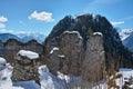 Ruins in snow-covered mountain landscape by clear view Royalty Free Stock Photo