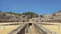 Ruins of the splendid amphitheater, part of archaeological ensemble of Italica, in Santiponce, Seville, Spain