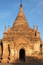 Ruins of stone pagoda at sunset at Bagan, Myanmar