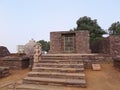 Ruins of Temple 31, dating from the 10th-11th century CE, with Stupa No. 3 in the background, Sanchi Buddhist Complex, India