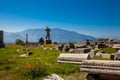 Ruins of the Temple of Venus at the ancient city of Pompeii and the mountains in spring