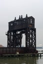 Ruins of the 69th Street Transfer Bridge in the Hudson River of New York City on a Foggy Day